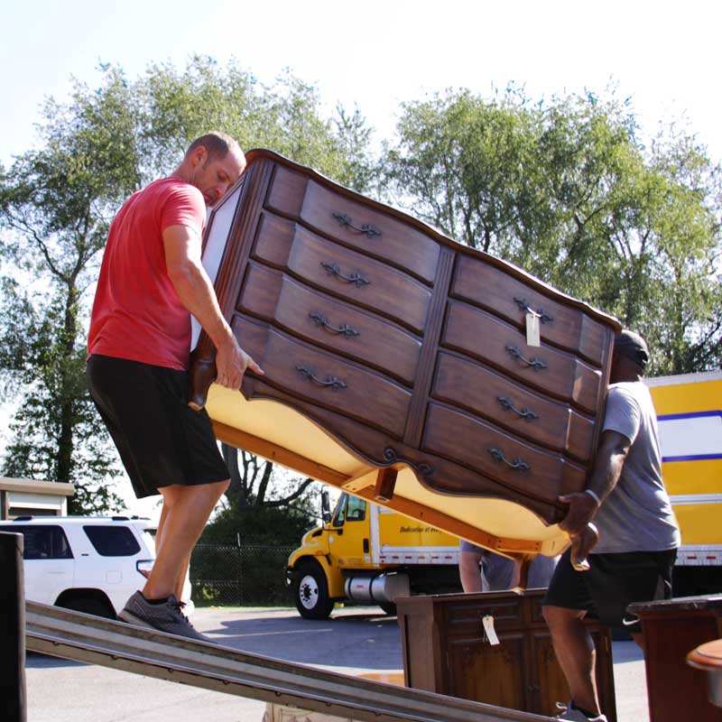 old Chester drawer being loaded off a moving truck